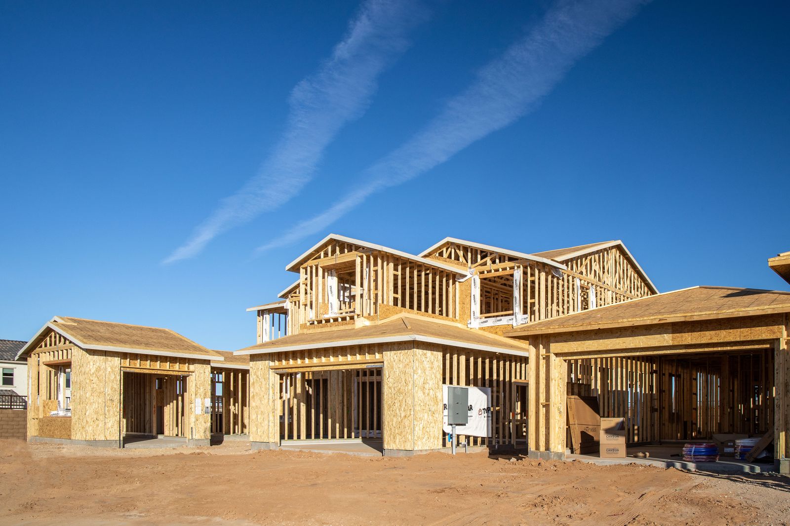 2-story residential with complex roofline