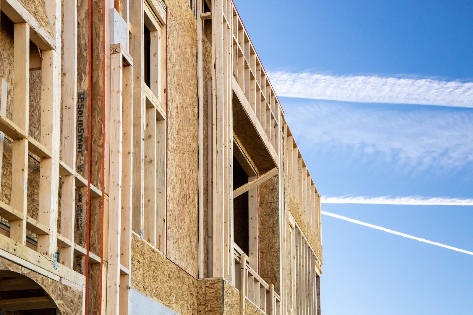 Wall framing detail against blue sky