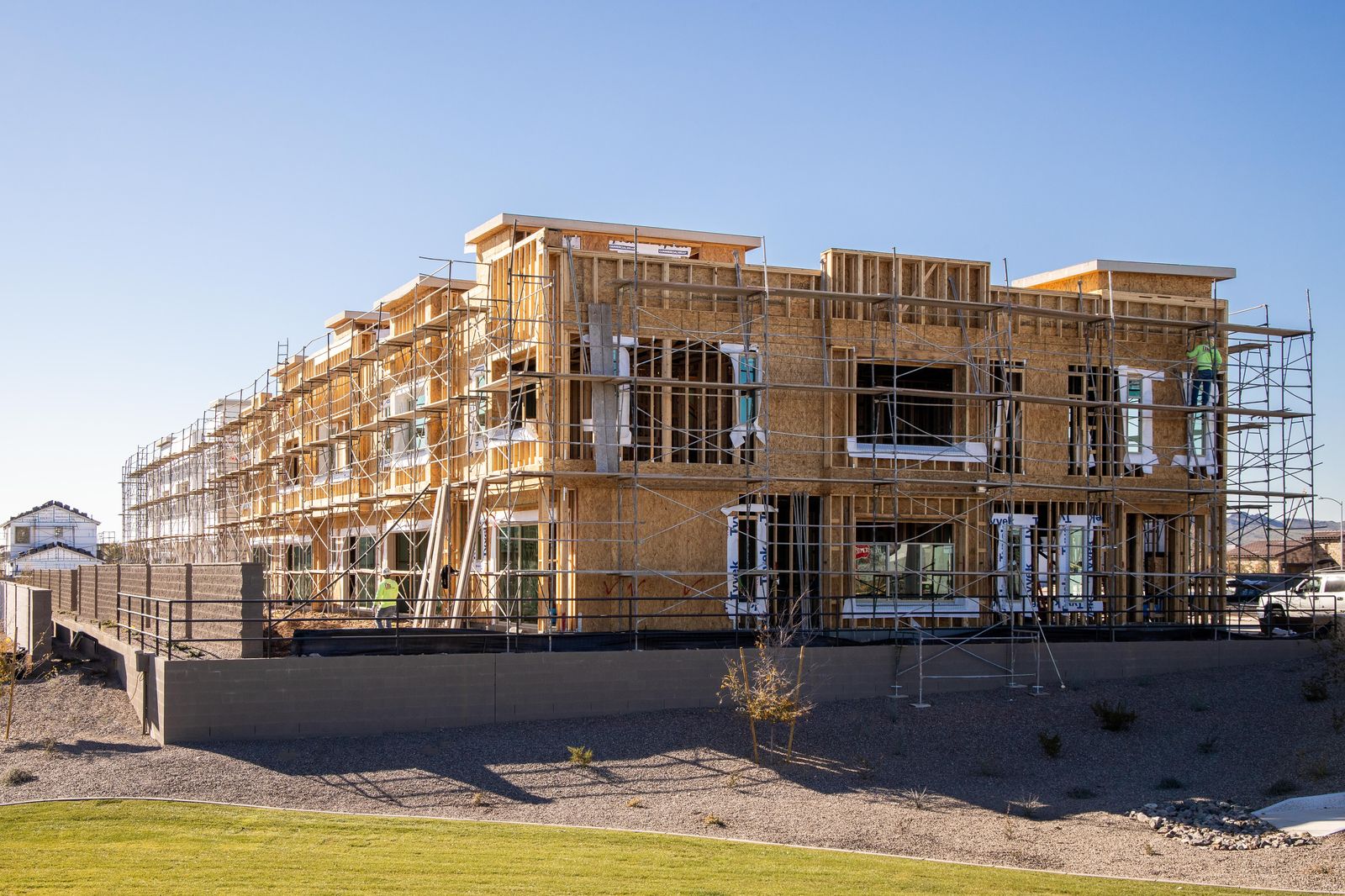 3-story framing with active crew